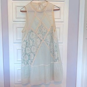 Off white and mint piece. Can be dress or shirt.